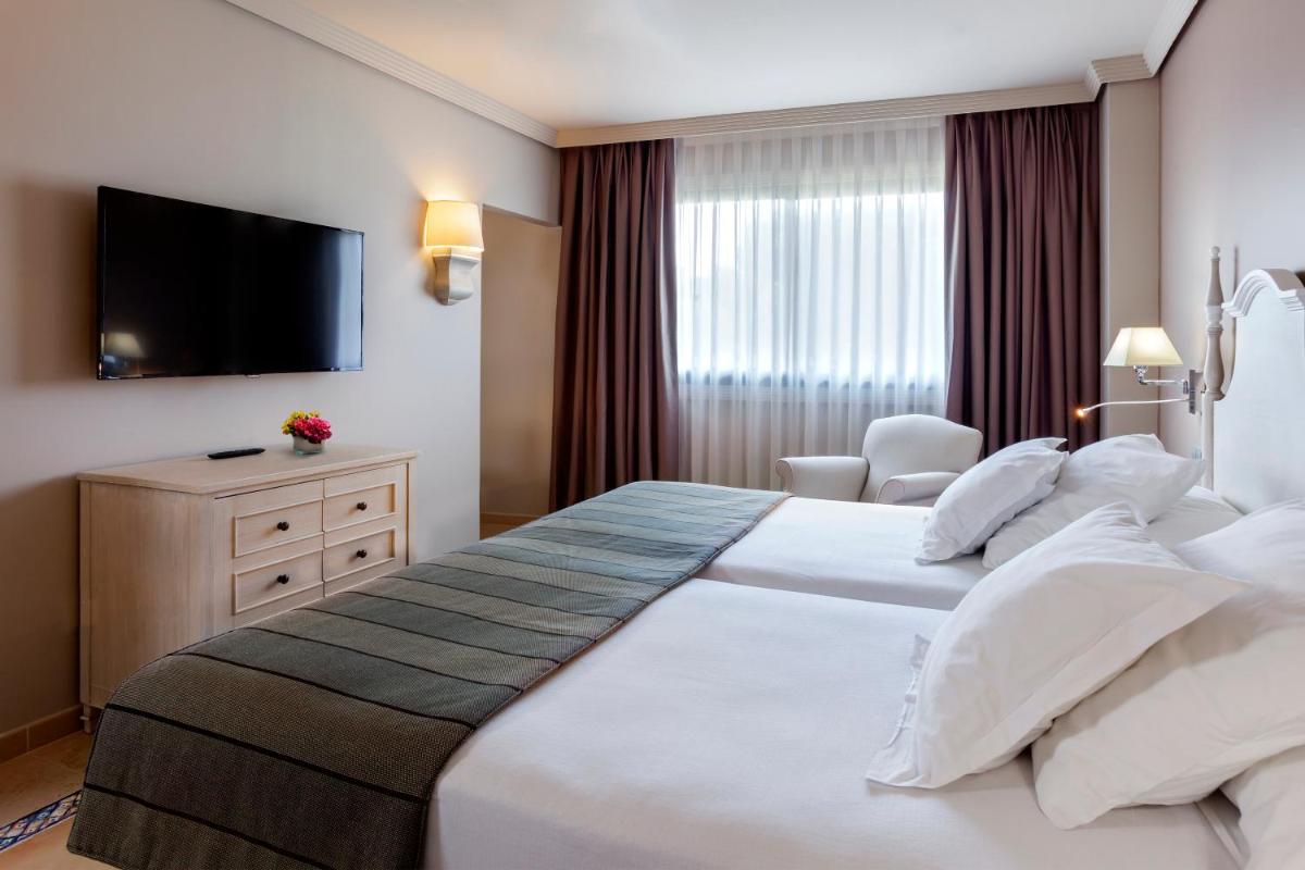 Cama o camas de una habitación en Barceló Marbella