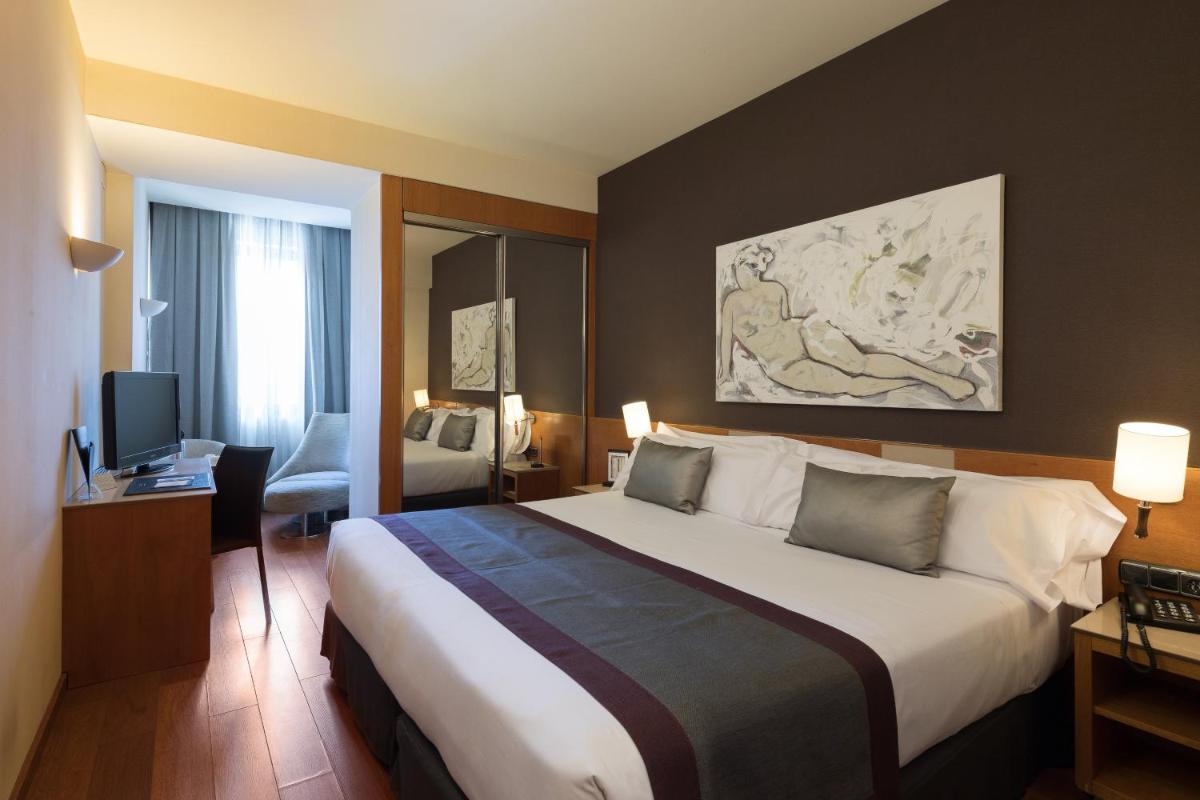 Cama o camas de una habitación en Catalonia Plaza Catalunya