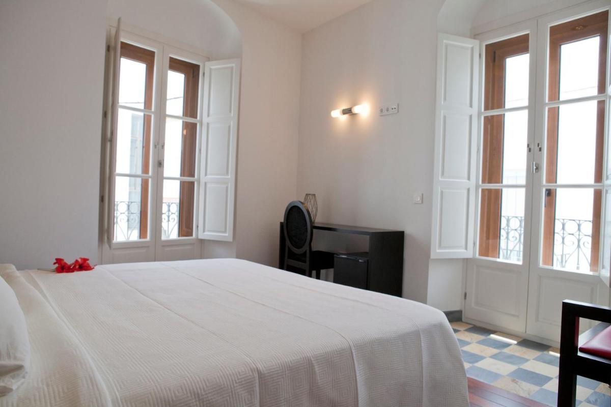 Hostal El Alojado de Velarde - Housity