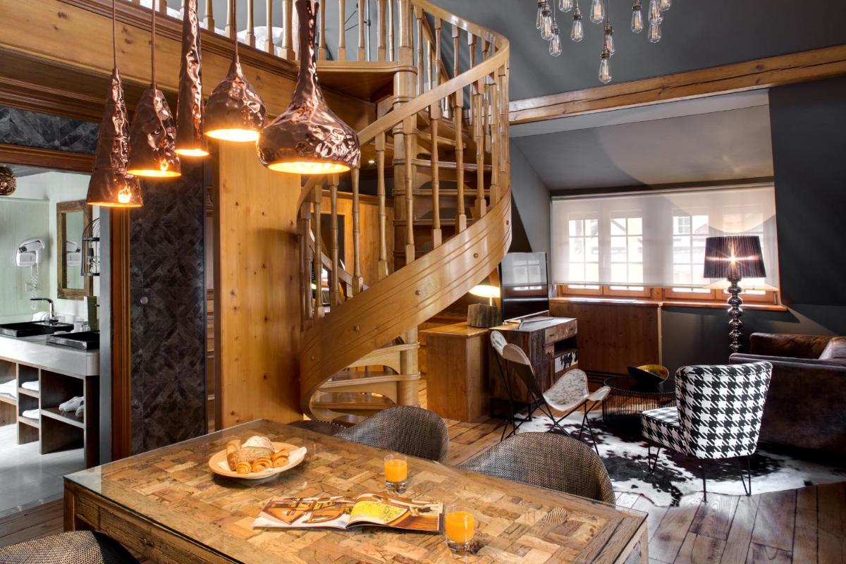 Coin salon dans l'établissement LA CHENEAUDIÈRE - Hôtel Spa - Relais & Châteaux - Restaurant étoilé
