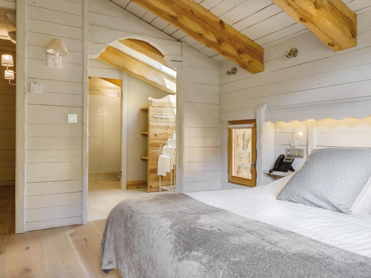 Cama o camas de una habitación en Hotel Viñas de Lárrede