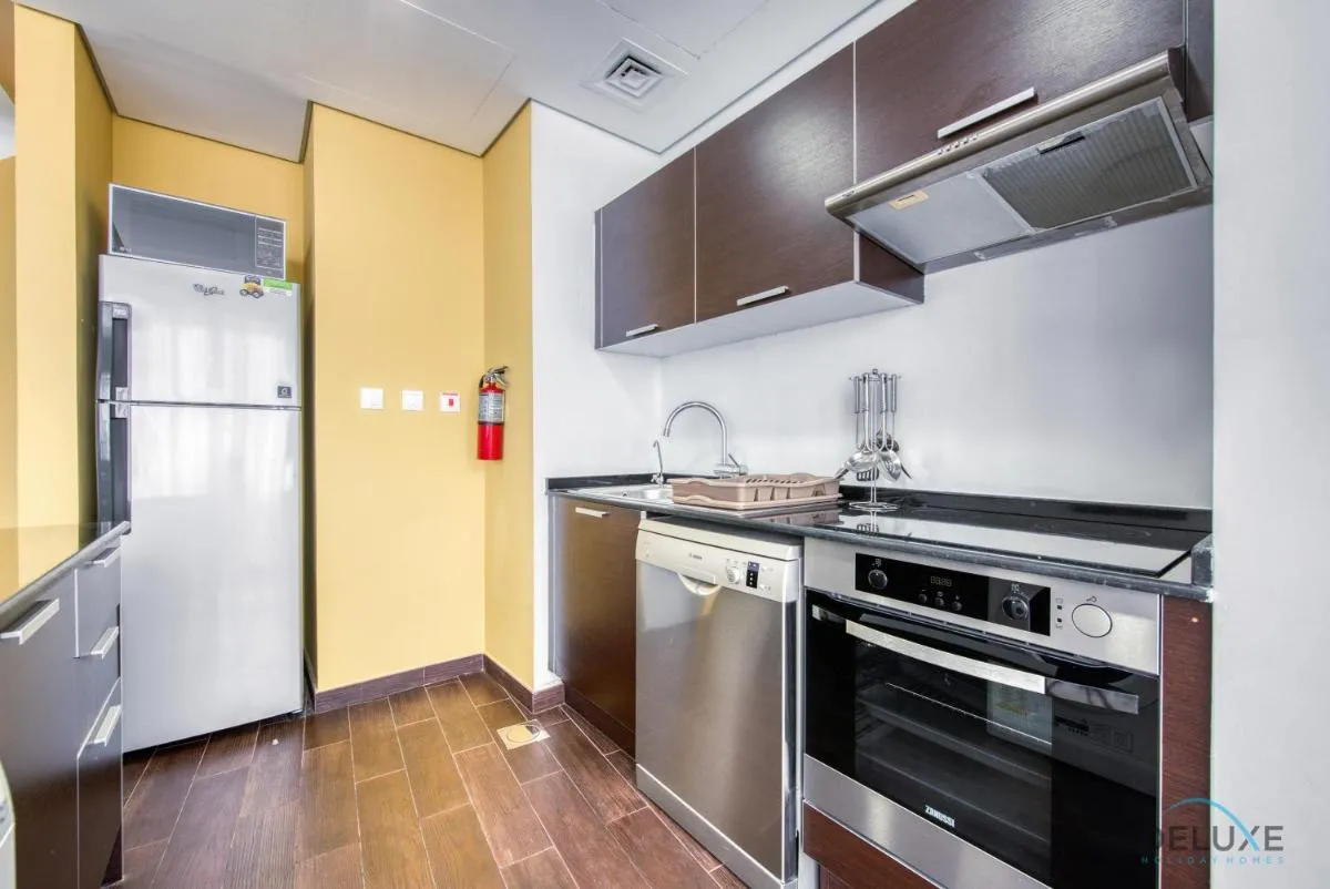 Homely 1BR at The Matrix Dubai Sports City by Deluxe Holiday Homes — صورة 3