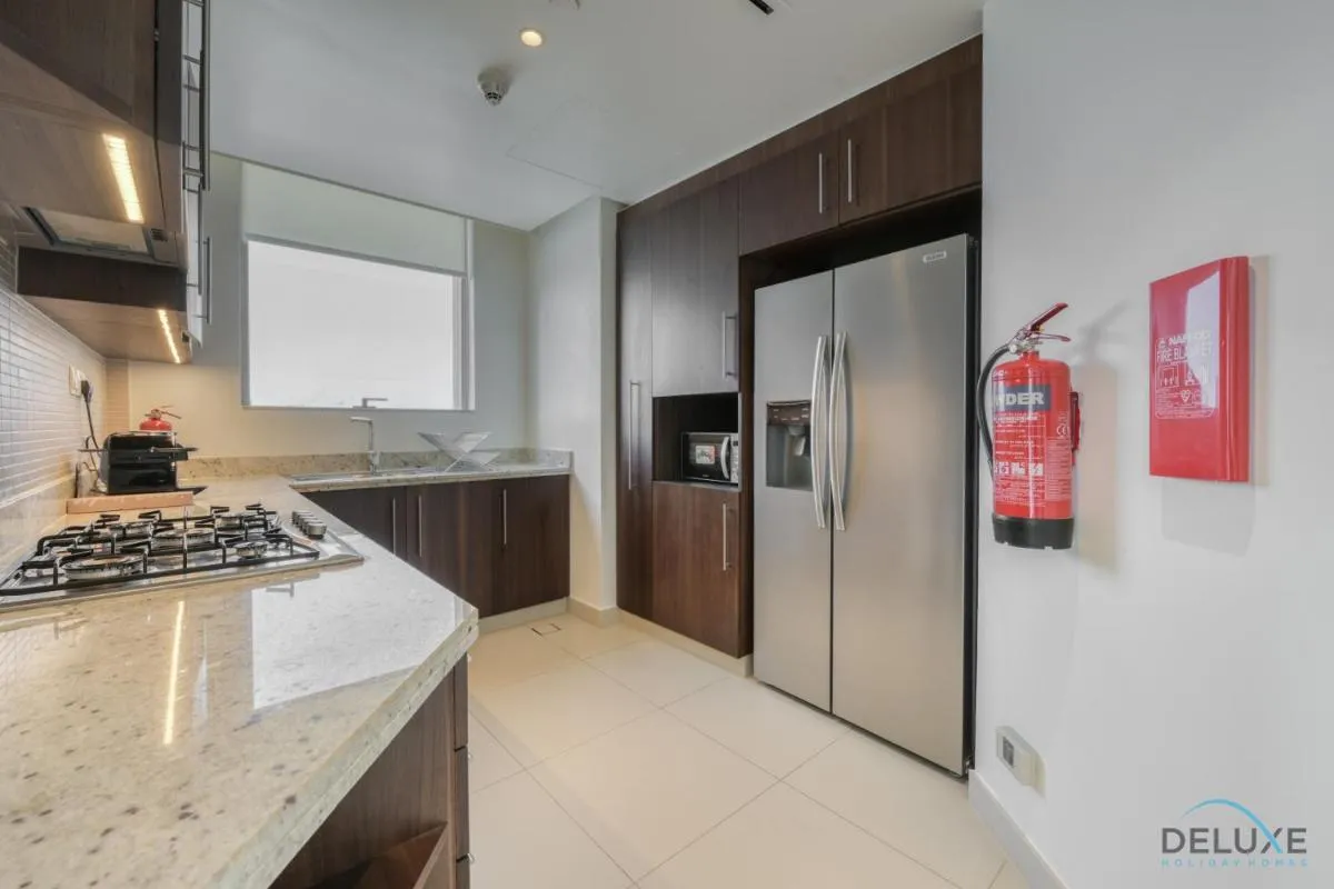 Luxurious 2BR Apartment at Boulevard Point Downtown Dubai by Deluxe Holiday Homes — صورة 4
