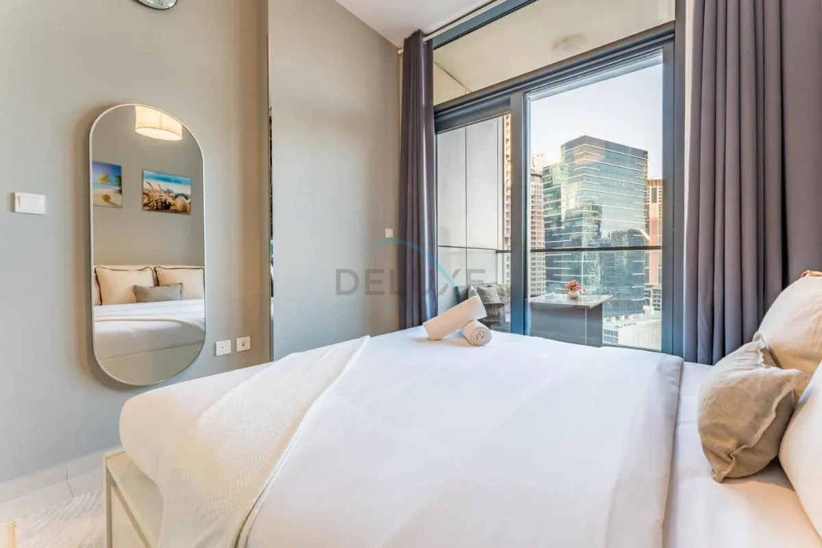 ⁨Dubai Canal and City Views 1BR, Minutes Drive to Burj Khalifa, DAMAC Zada Tower, Business Bay by Deluxe Holiday Homes⁩ — صورة 16
