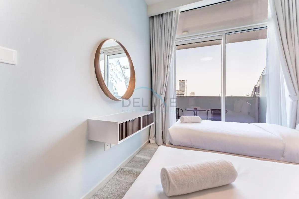 ⁨High-Rise 2BR with Dubai Water Canal View, Quick Access to Downtown, Vera Tower, Business Bay by Deluxe Holiday Homes⁩ — صورة 14