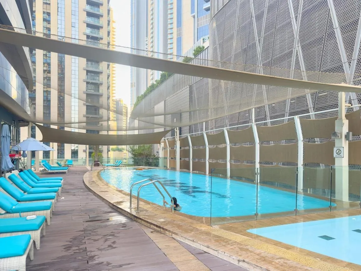 ⁨2min to Dubai Mall - Pool, Gym, Sauna - Full Burj View⁩ — صورة 16