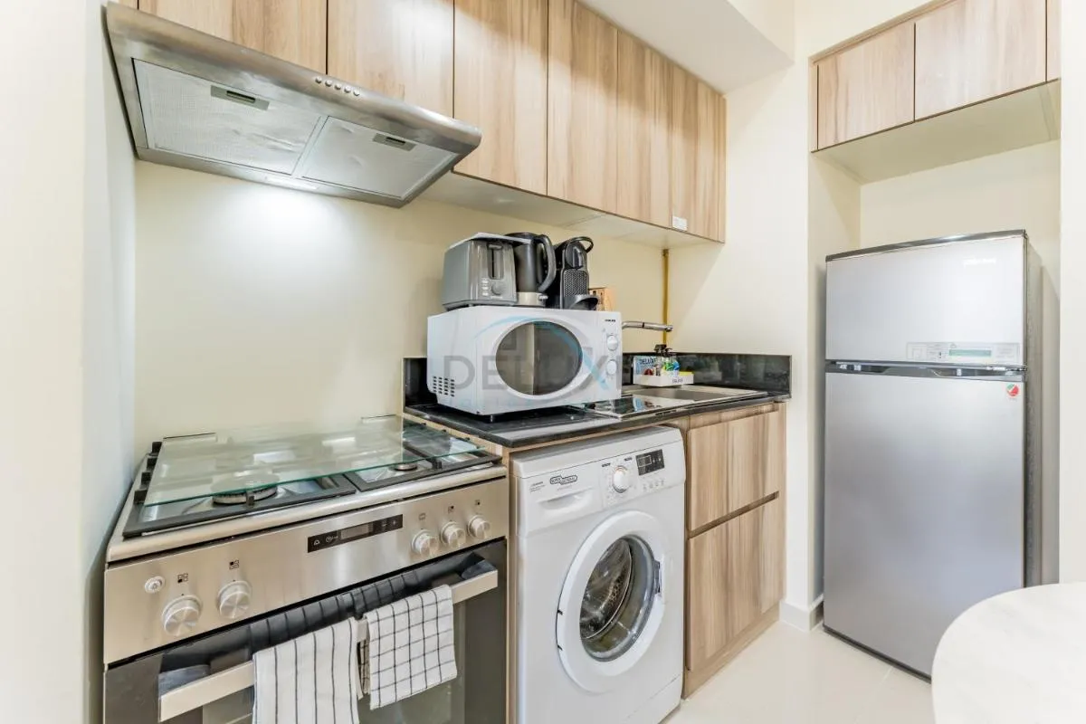 Conveniently Located Minutes from Dubai Hills Mall, Park, Golf Club, and Essential City Landmarks 1BR with Premium Facilities, Damac Hills Golf Vita A, Damac Hills 1 by Deluxe Holiday Homes — صورة 4