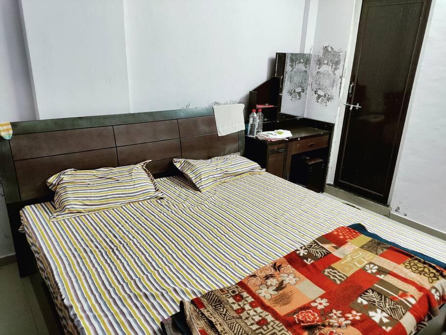 1BHK Entire Flat with Kitchen R O Water AC Geyser Fridge TV Washing Machine - Housity