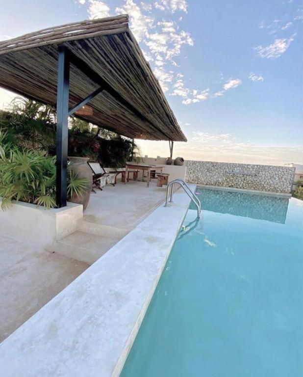 TEQILA Luminous Flat with free Tequila & Rooftop pool Near to the Beach & Cenotes - Housity