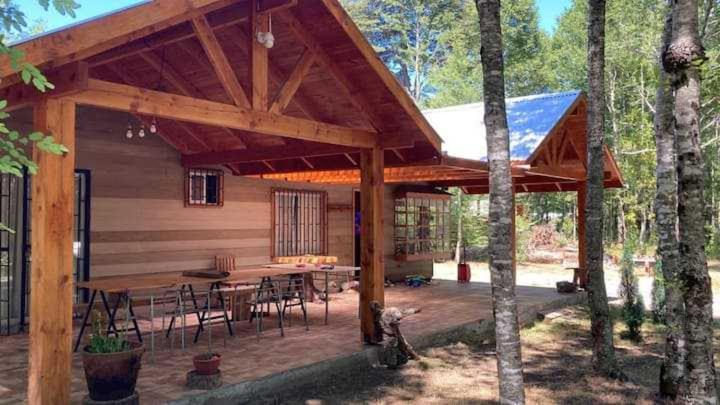 Parcela con casa en Puc�n