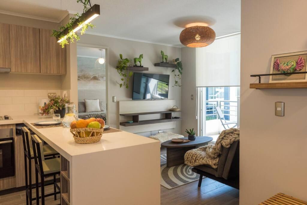 PUCON DEPARTAMENTO DOS HABITACIONES DOS BA�OS, en condominio, estacionamiento,balcon, nuevo y equipado, WIFI Y CABLE, PISCINA CON JARDINES, ZONA TRANQUILA A SOLO 5 MINUTOS DEL CENTRO EN AUTO