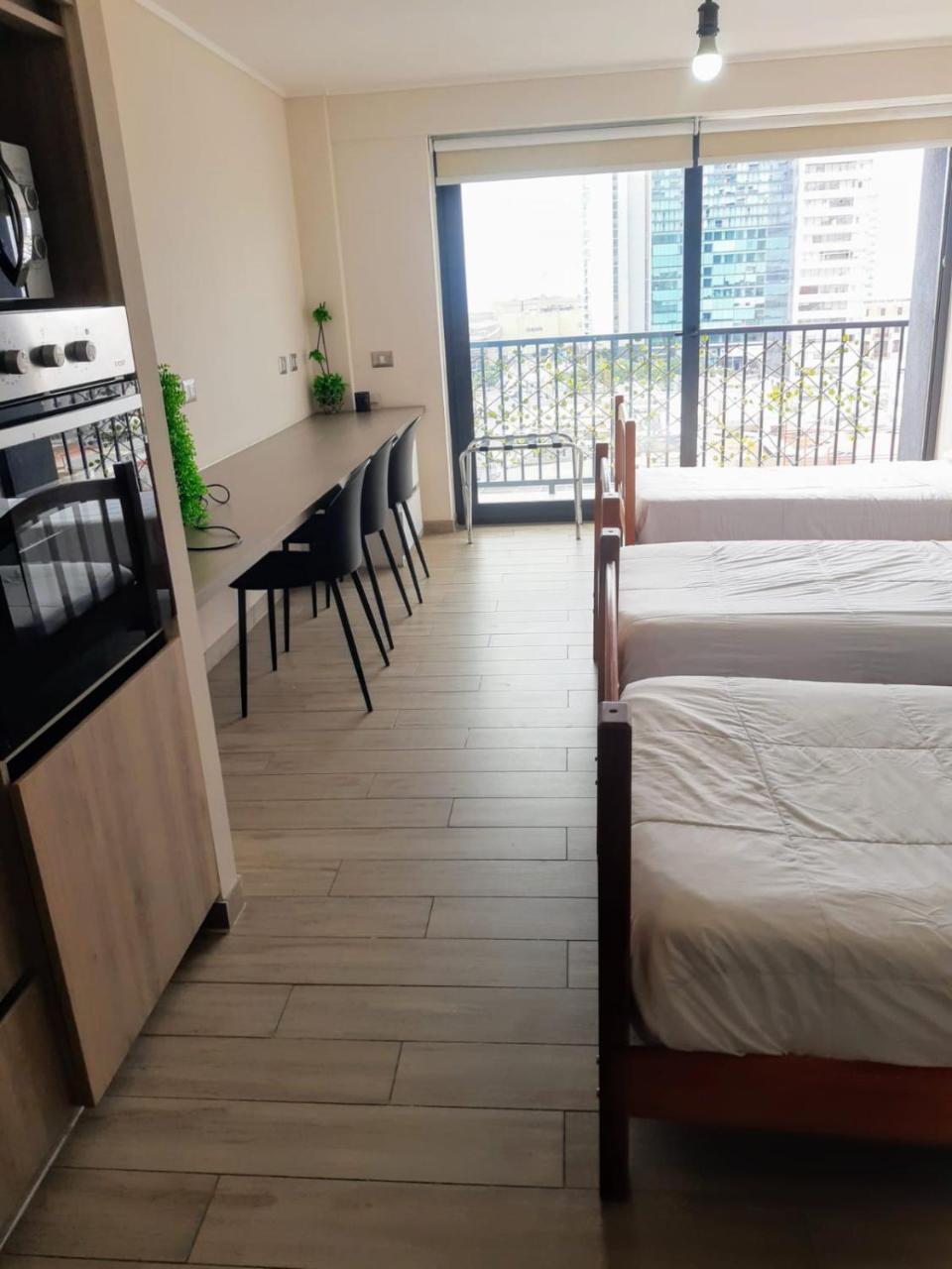 Suit con cocina central