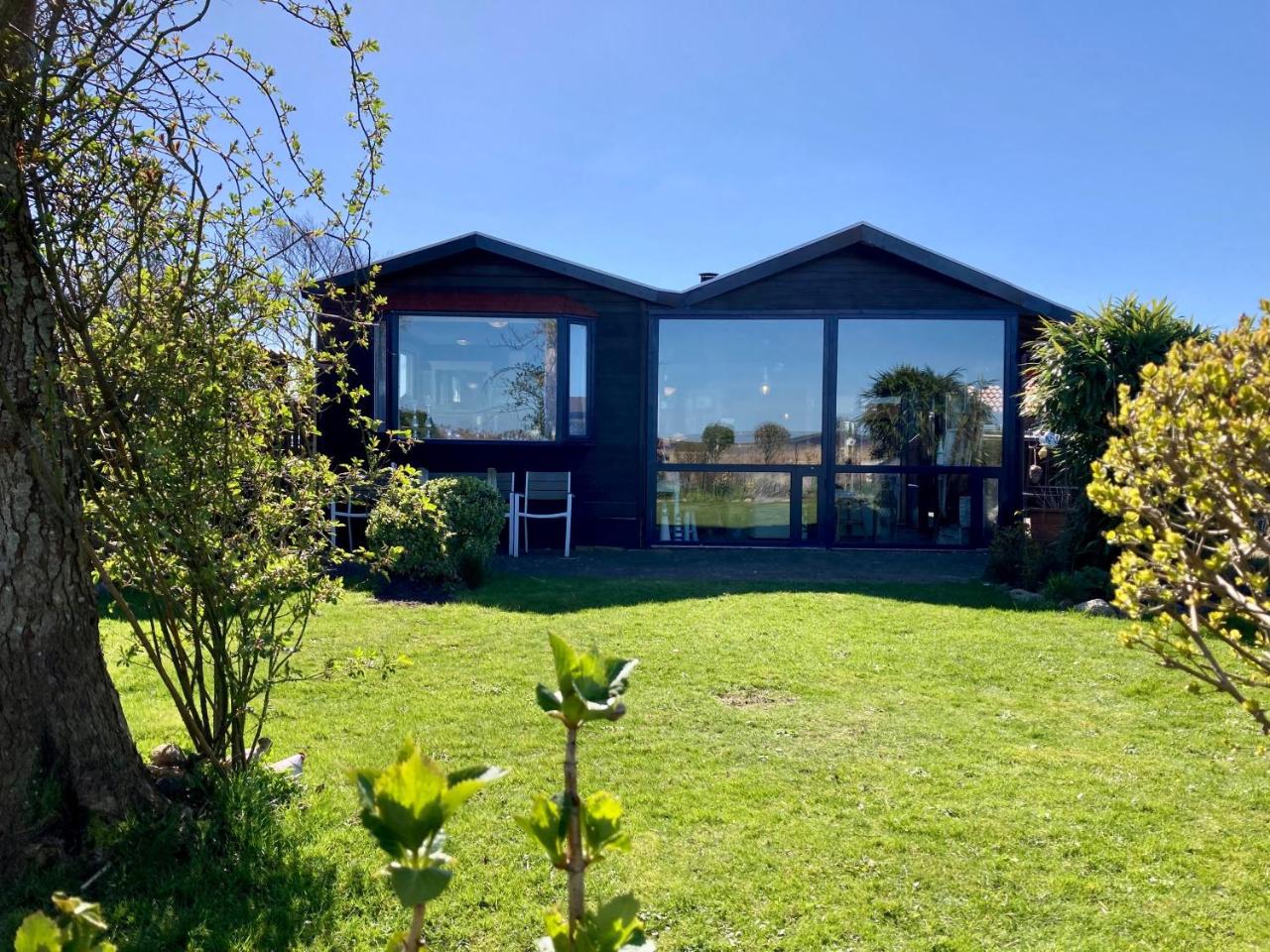 Image: 6 pers House Marijke with winter garden and direct access to the Lauwersmeer
