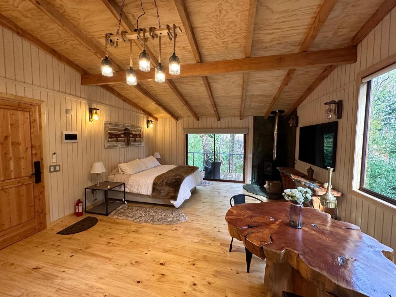 Caba�a R�o y Playa, sector Carmelito, Puc�n