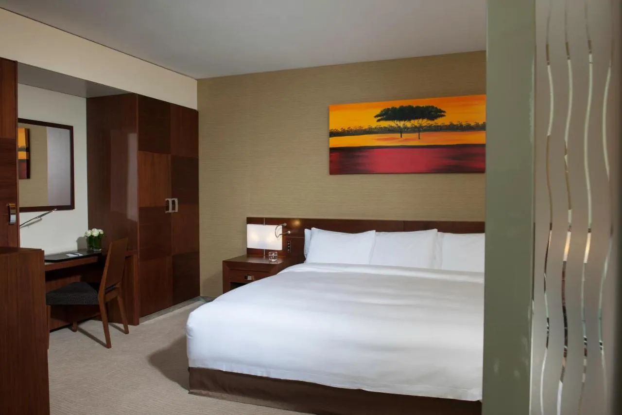 Une image de la chambre de Fairmont Grand Hotel Genève.