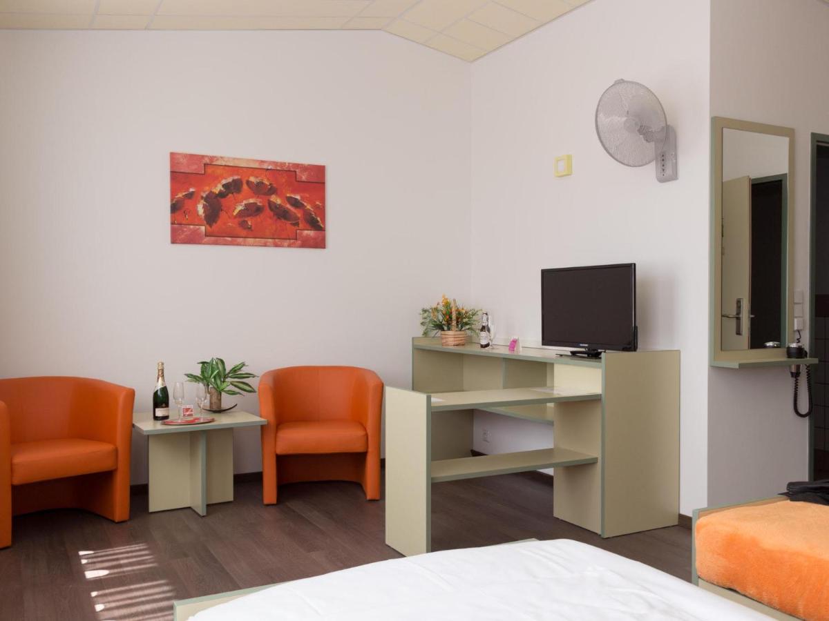 Winrooms Seminar Hotel & Apartments photo