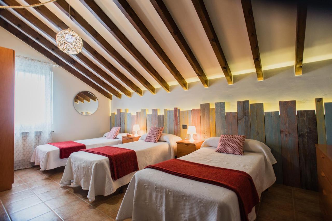 Cama o camas de una habitación en Apartamentos River Santander