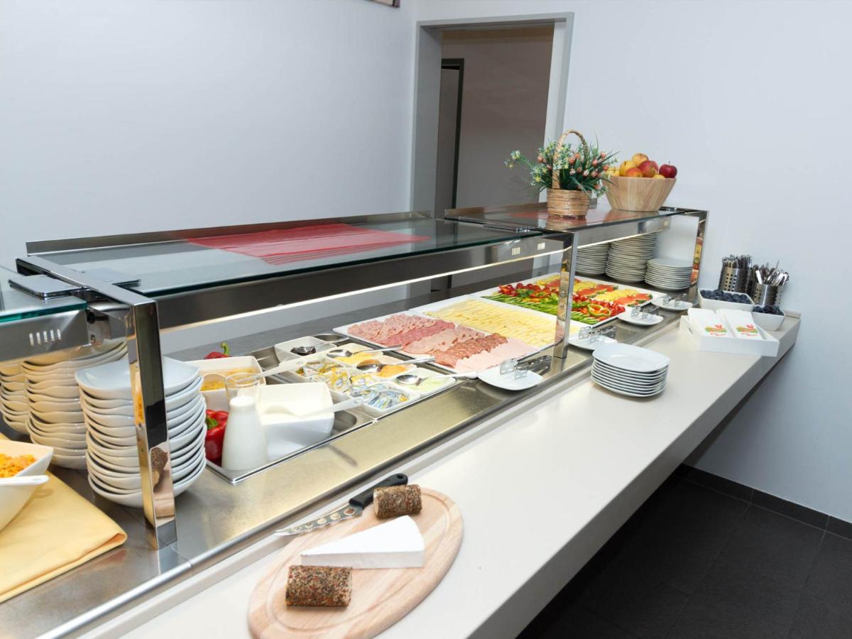 Winrooms Seminar Hotel & Apartments photo
