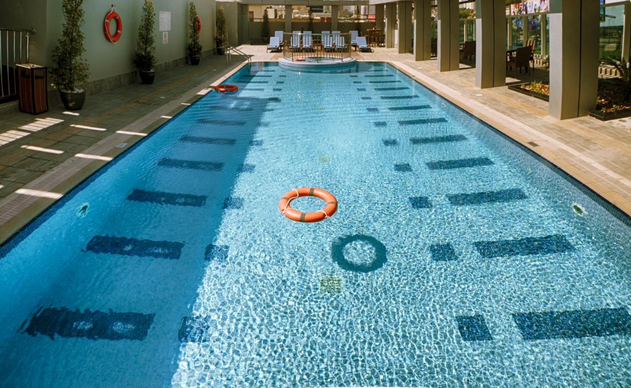 Rooftop swimming pool: Rose Park Hotel - Al Barsha, Opposite Metro Station