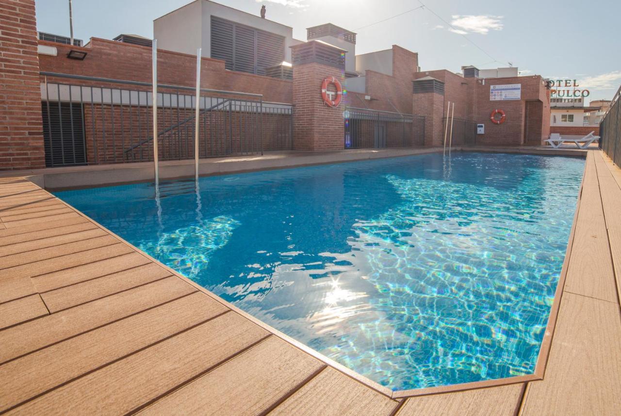 Rooftop swimming pool: Apartaments Ponent