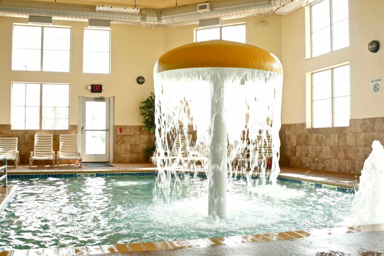 Heated swimming pool: AmericInn by Wyndham Fargo Medical Center