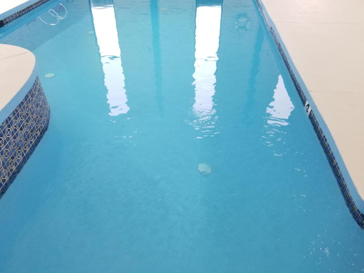 Heated swimming pool: Hampton Village Inn