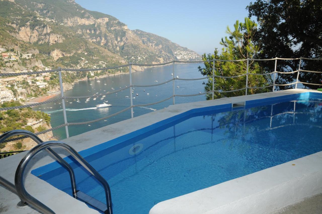 Heated swimming pool: Positano Luxury Villas