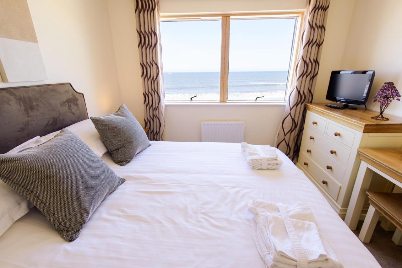 The Sands - Sea Front Apartments - Laterooms
