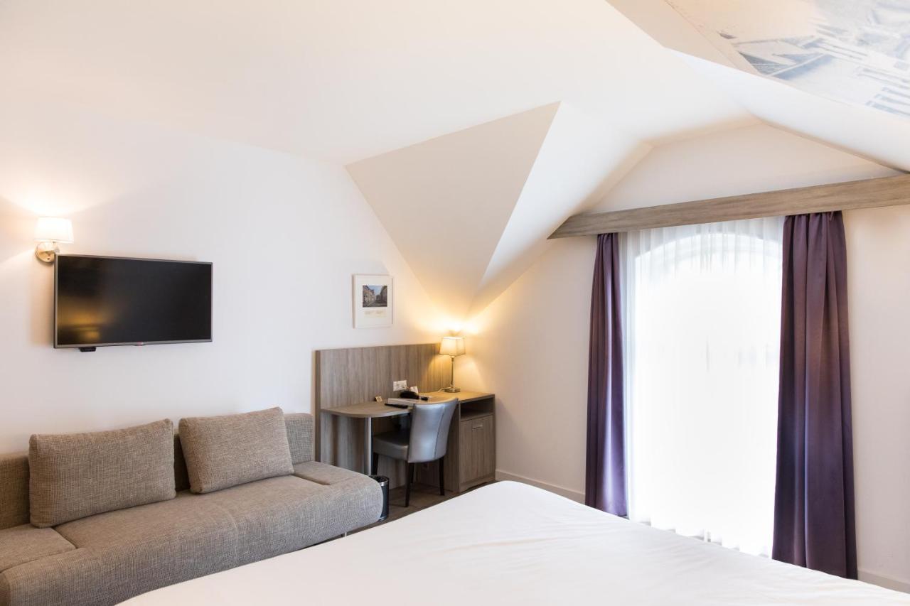 Een TV en/of entertainmentcenter bij Best Western City Hotel Woerden