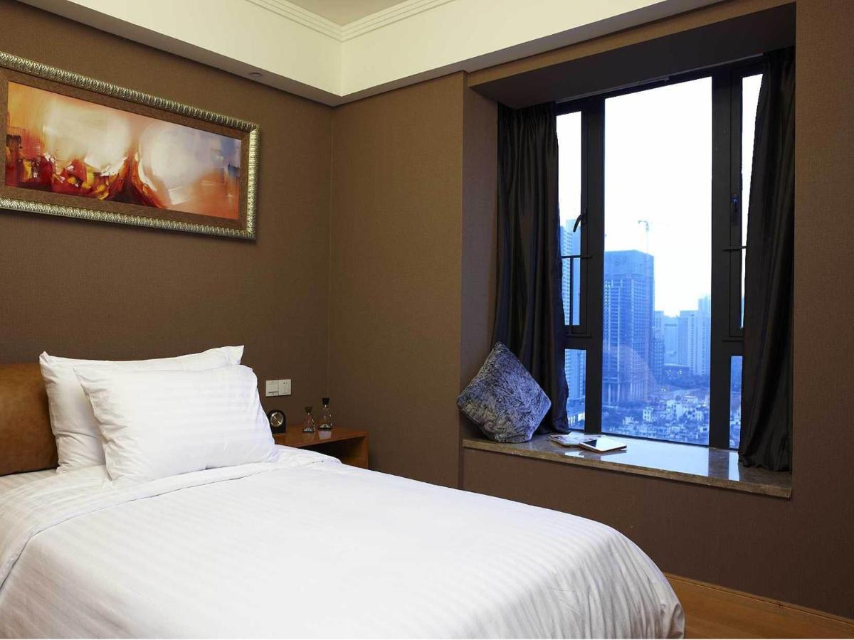 Фото Dan Executive Hotel Apartment Zhujiang New Town