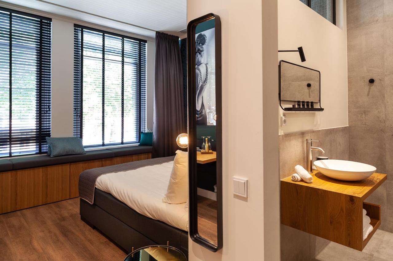 Een badkamer bij Hotel Julien