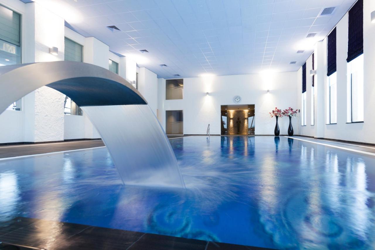 Heated swimming pool: Van Der Valk Hotel Almere