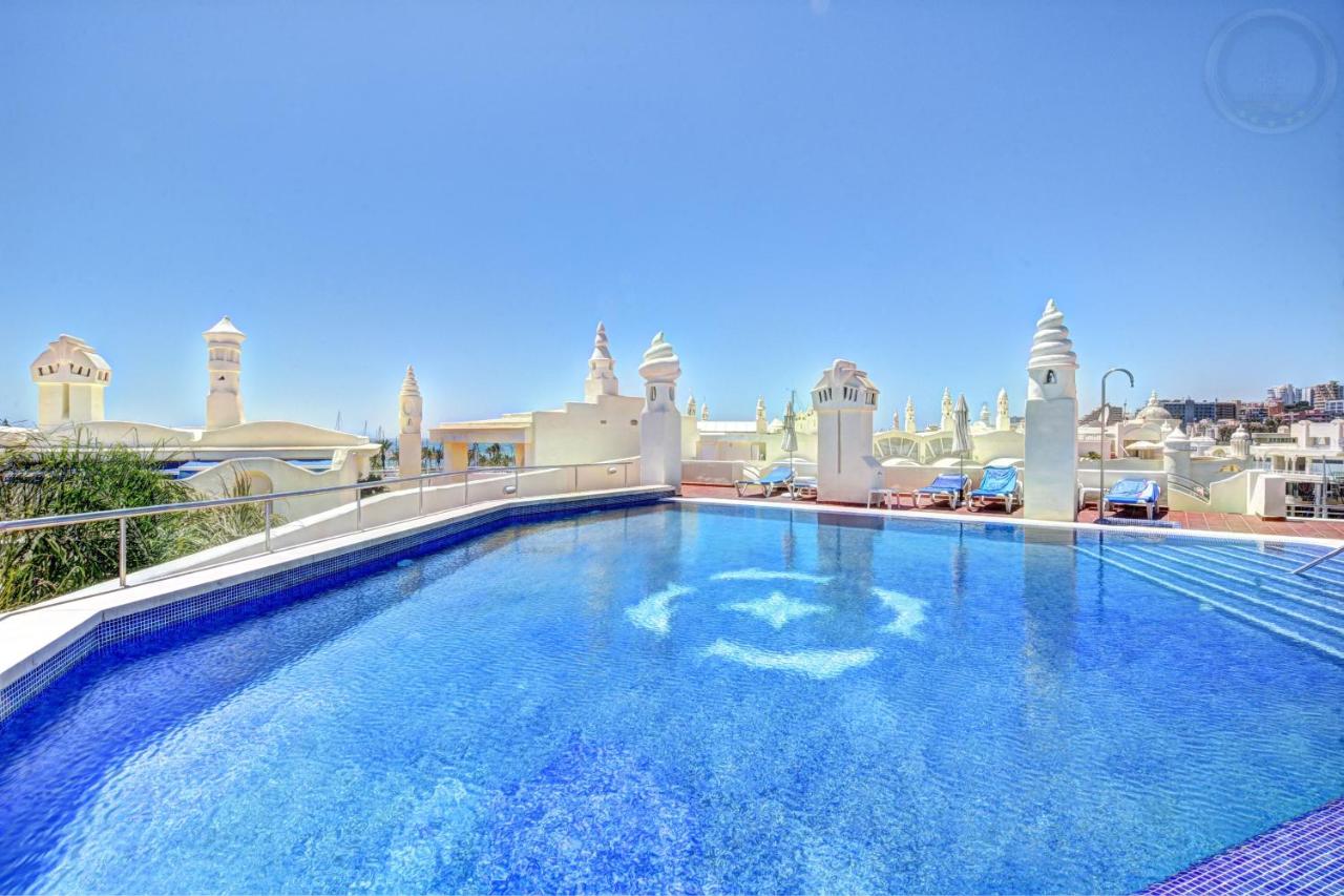Rooftop swimming pool: Puerto Marina Apartamento Exclusivo Benalmádena