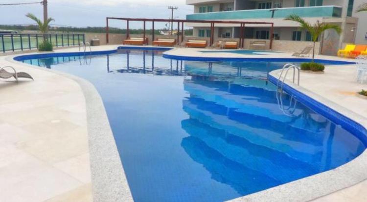 Heated swimming pool: Apartamento Le Bon Vivant Arraial do Cabo