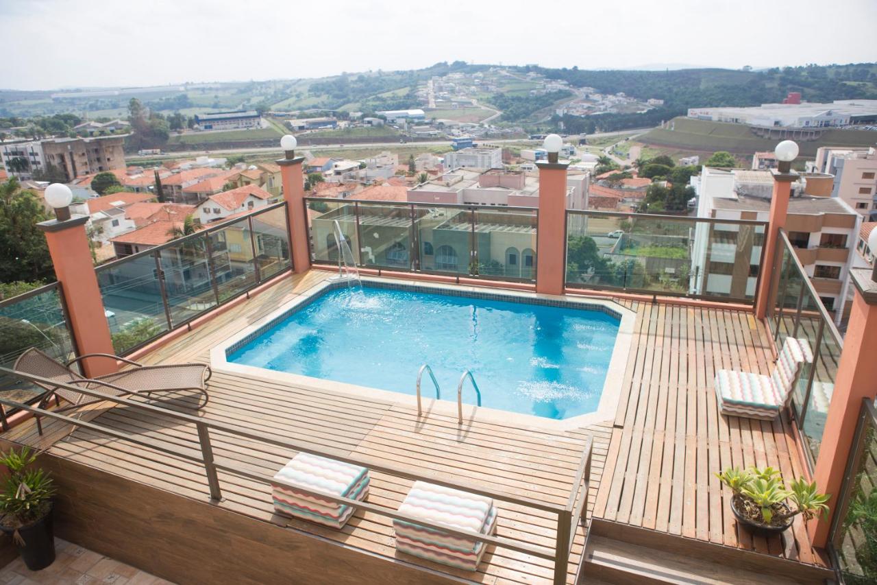 Rooftop swimming pool: Grand Enio Hotel e Cantina