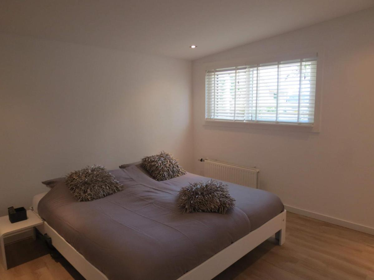 Een bed of bedden in een kamer bij 't Salehemse Huuske