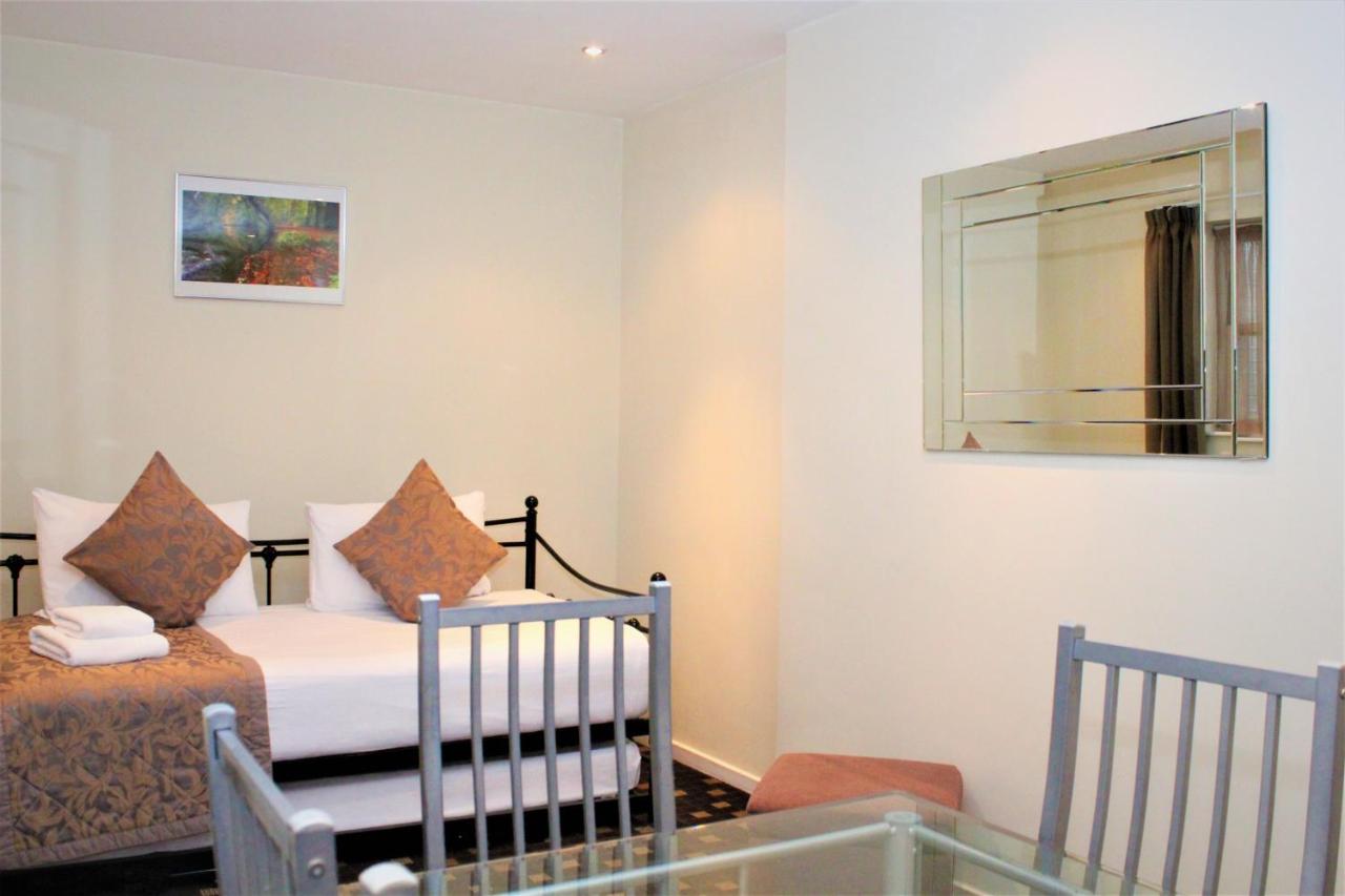 Grand Plaza Serviced Apartments - Laterooms