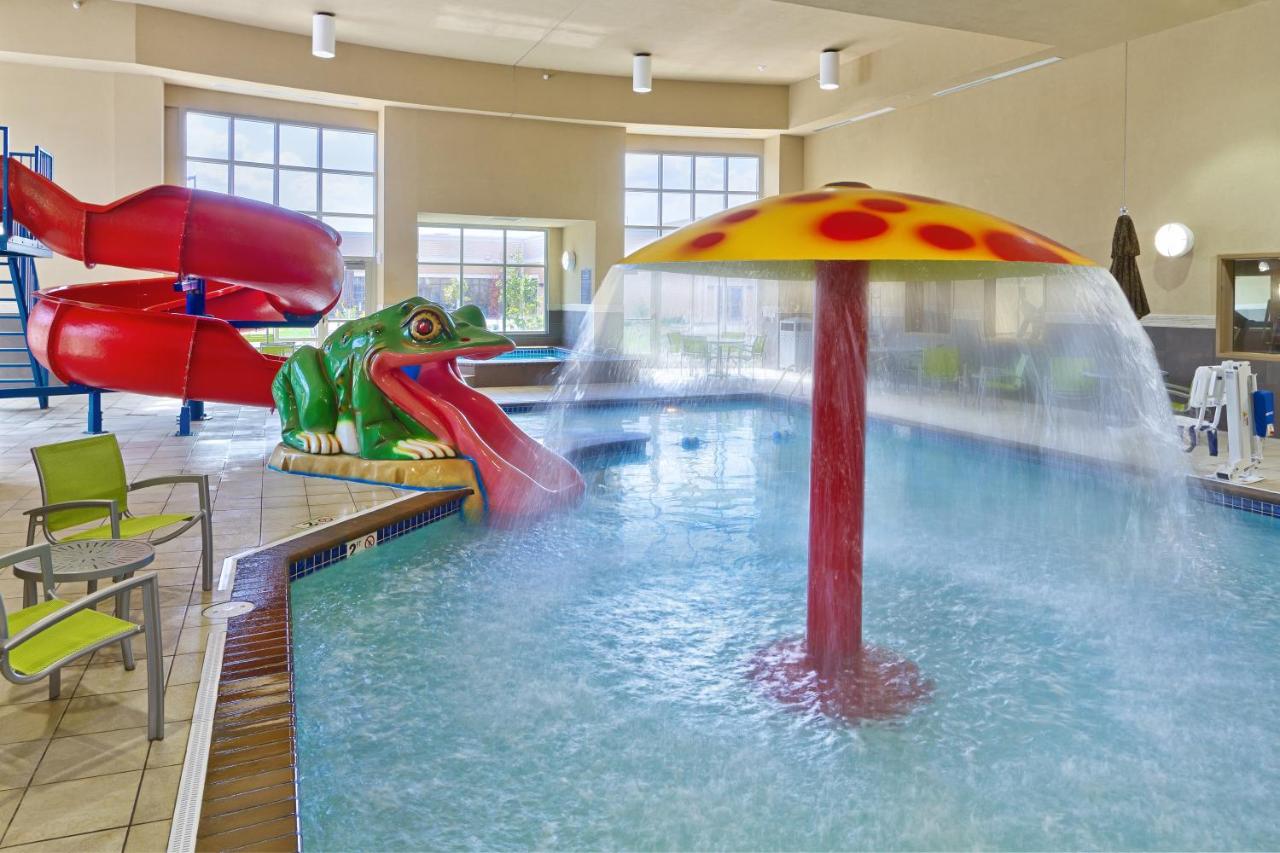 Heated swimming pool: ClubHouse Hotel and Suites
