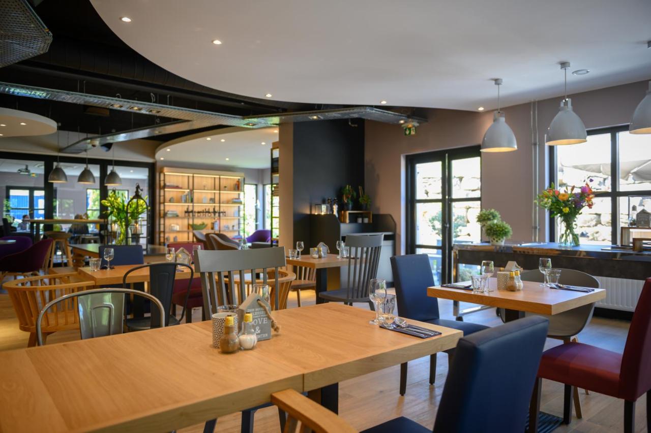 Een restaurant of ander eetgelegenheid bij Campanile Hotel & Restaurant Eindhoven