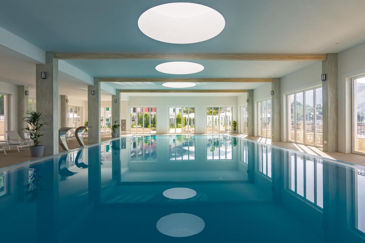 Heated swimming pool: Lazure Hotel & Marina