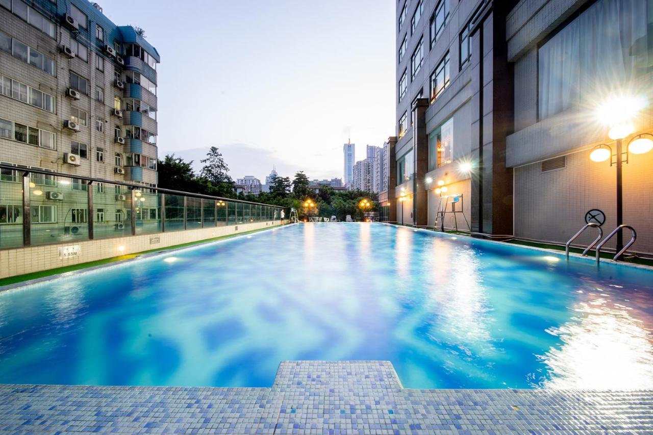 Heated swimming pool: Grand International Hotel