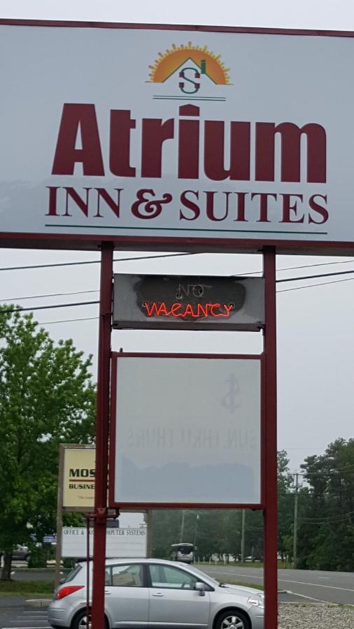 Atrium Inn & Suites — photo 14