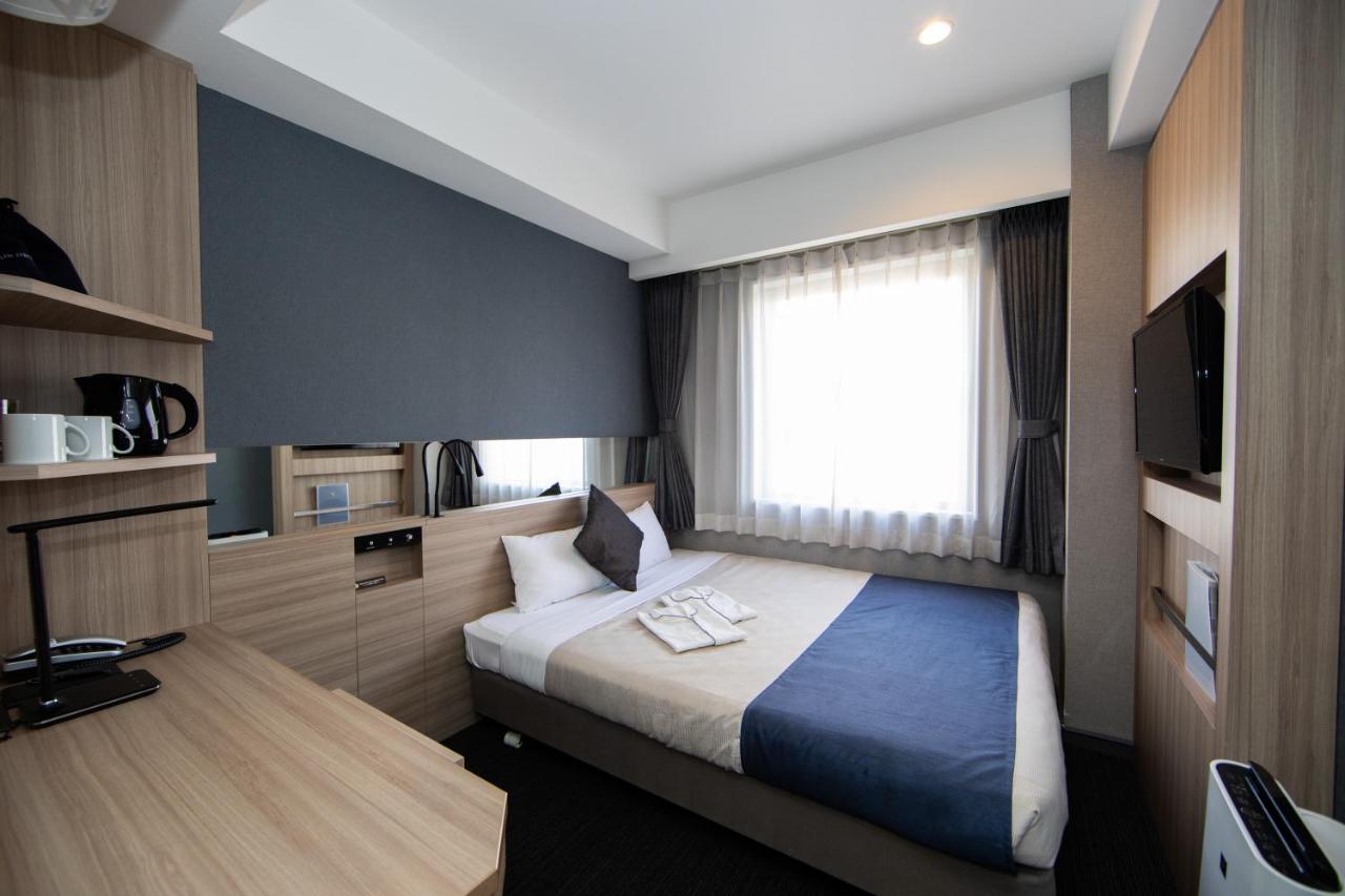 Quintessa Hotel Osaka Shinsaibashi Comic & Books - 4