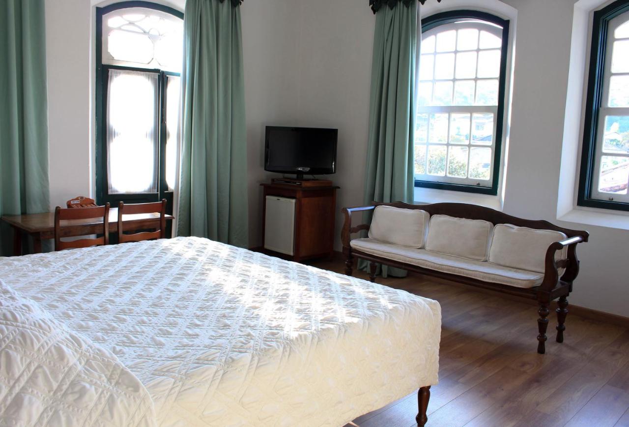 Hotel Luxor — quarto