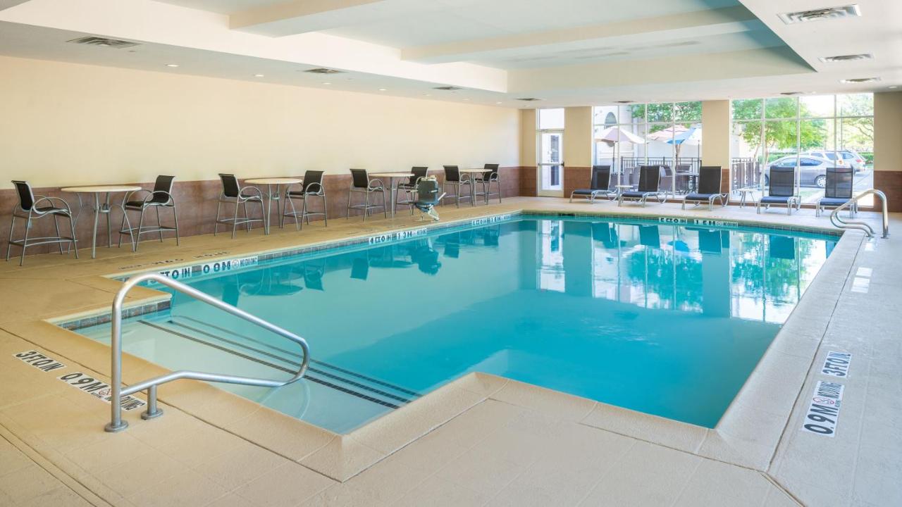 Heated swimming pool: Holiday Inn Houston West - Westway Park, an IHG Hotel