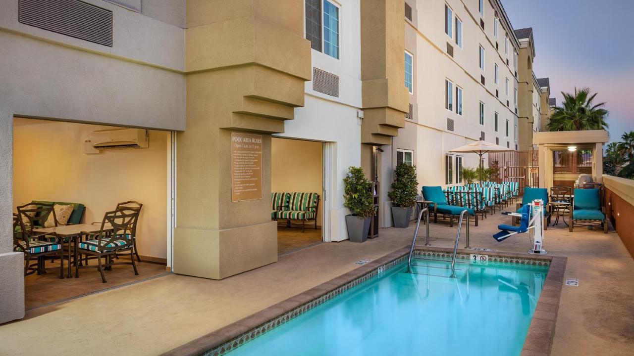 Heated swimming pool: Candlewood Suites Anaheim - Resort Area, an IHG Hotel