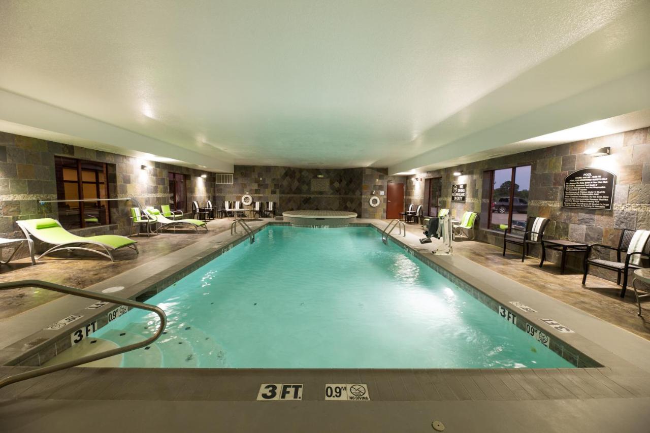 Heated swimming pool: Holiday Inn Express Hotel & Suites Clinton, an IHG Hotel
