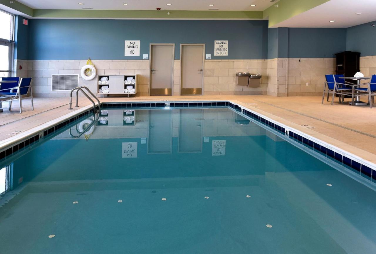 Heated swimming pool: Holiday Inn Express & Suites - Madisonville, an IHG Hotel