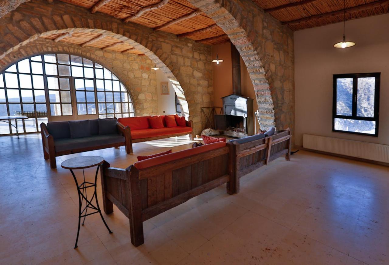 The lounge under stone arches