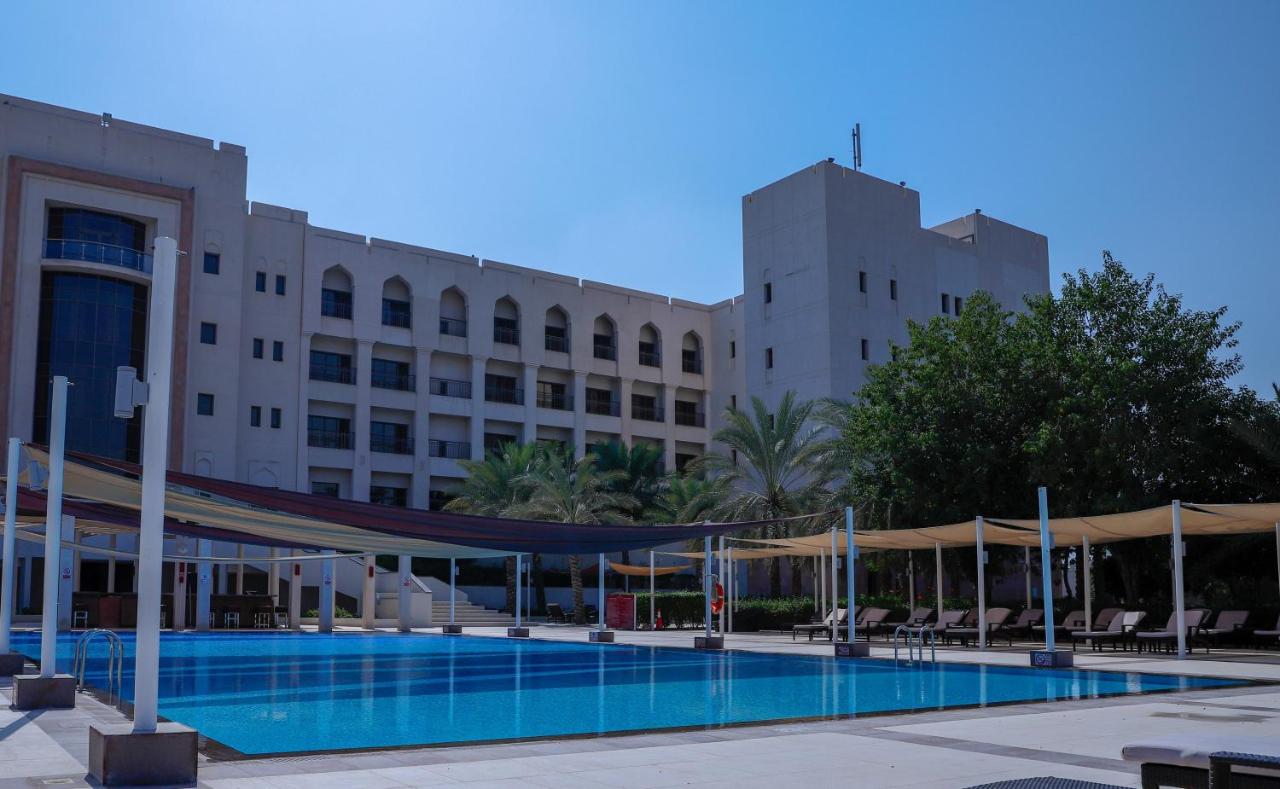 Heated swimming pool: Crowne Plaza Sohar, an IHG Hotel